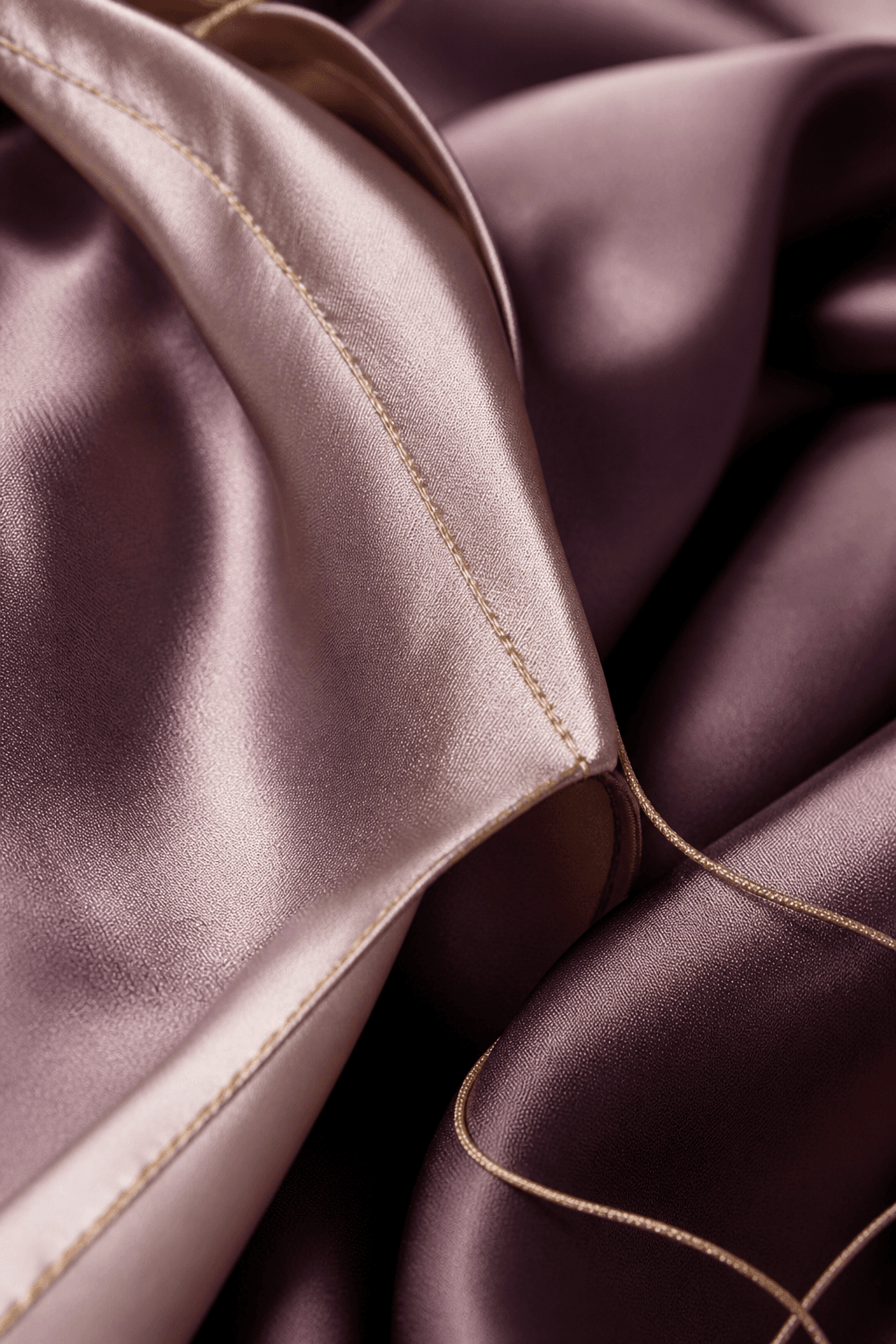 Close-up of luxurious silk fabric and fine stitching
